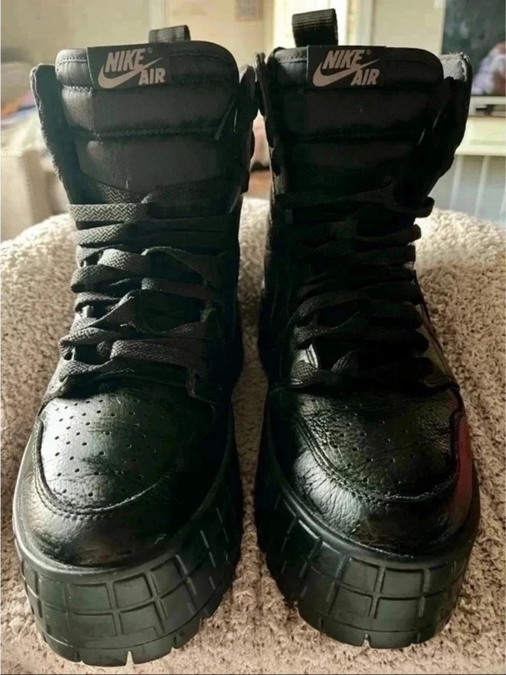 Nike Air Womenβs Black High-Top Platform Sneakers